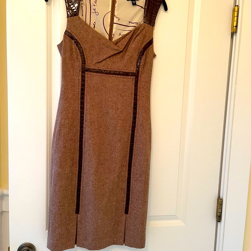 Bebe wool sheath dress, vegan leather trim. Fully lined and form fitting.